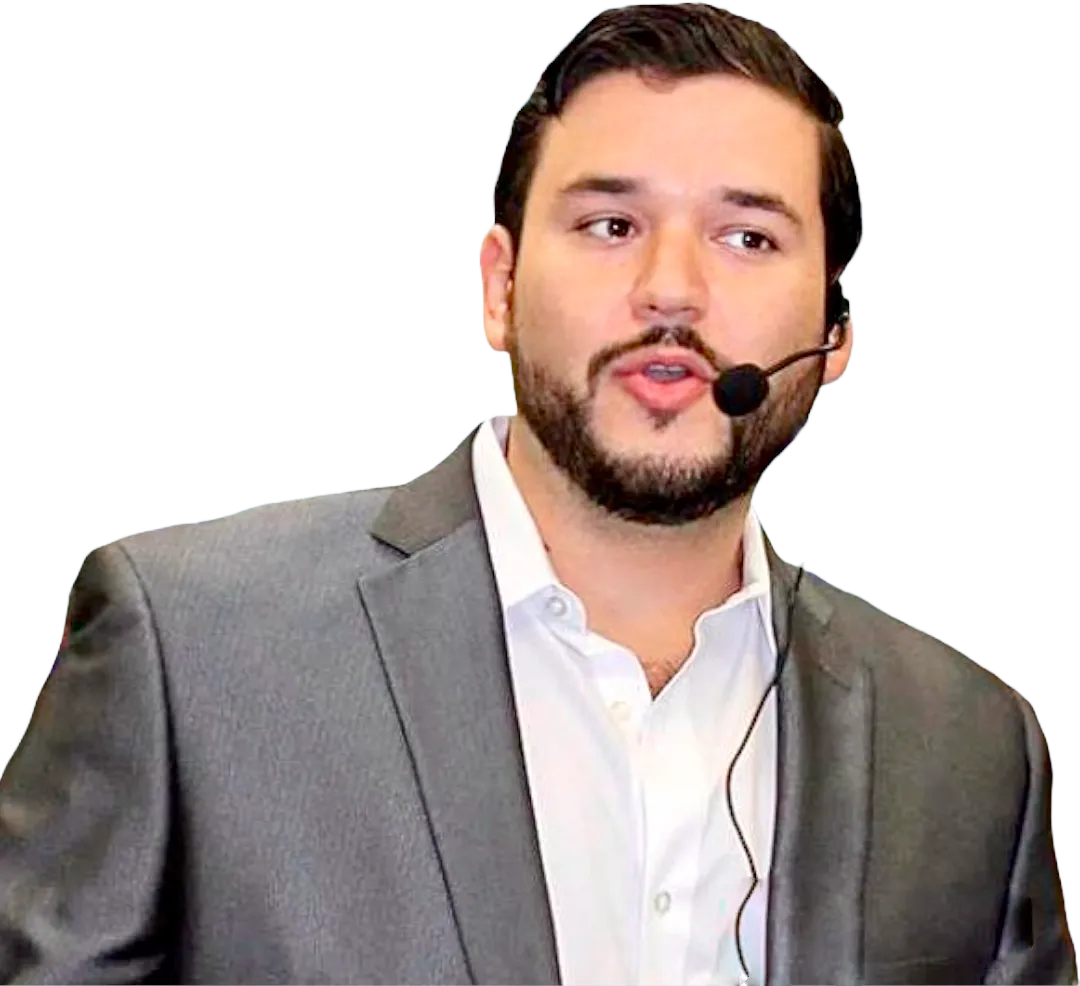 Andrew Carles speaking with a headset microphone