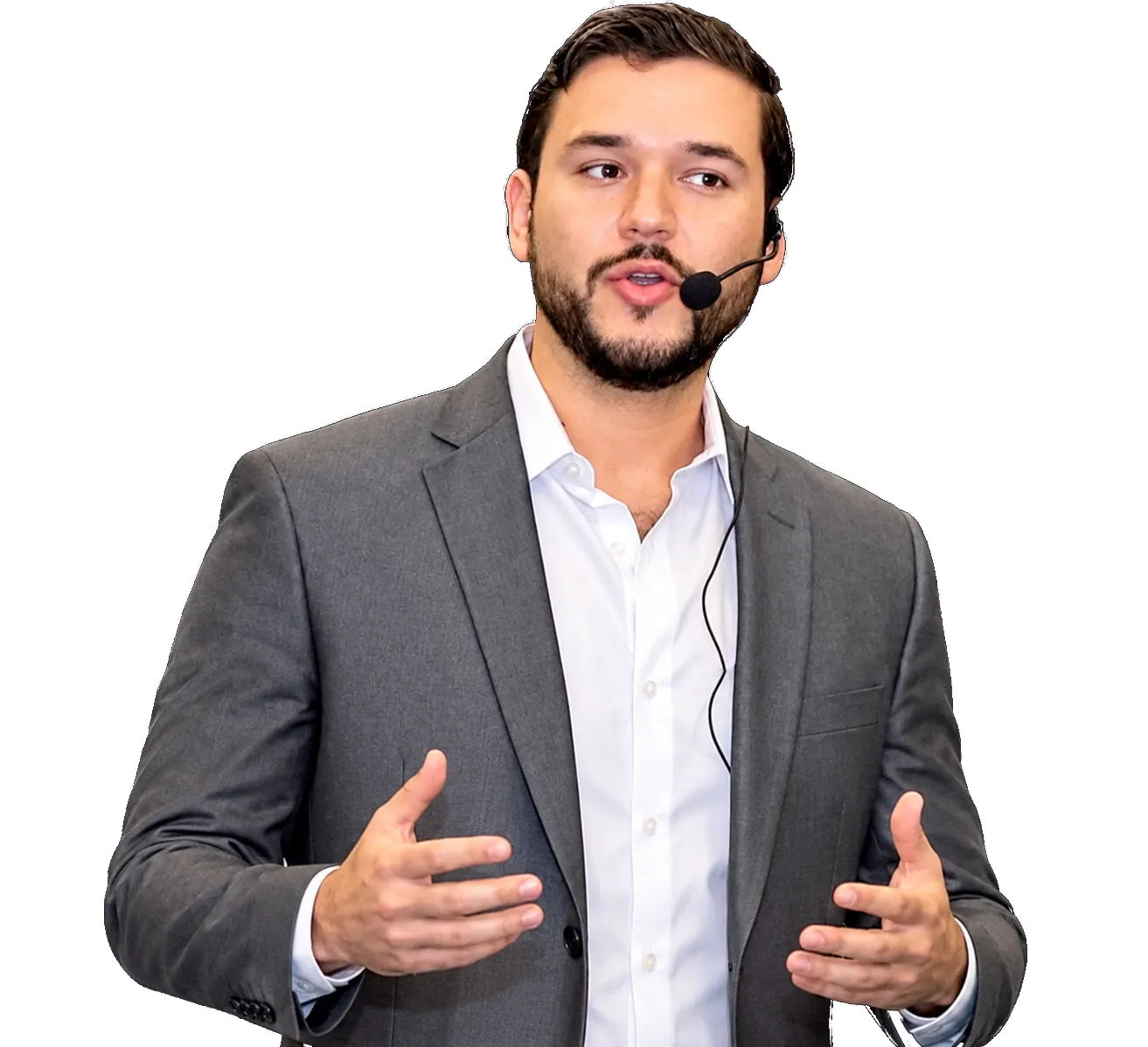 Andrew Carles speaking with a headset microphone
