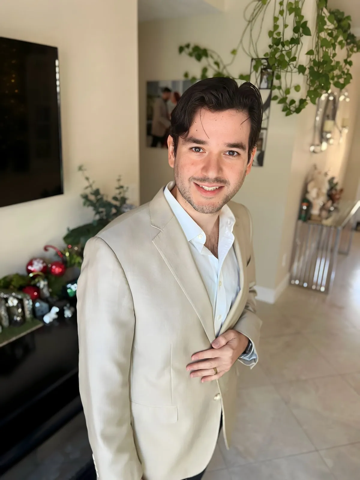 Andrew in a cream blazer